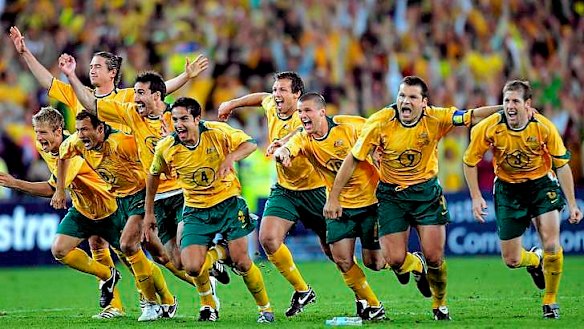 Heartbreak over: The Socceroos celebrate qualifying for the 2006 World Cup after John Aloisi slotted home the winning penalty.