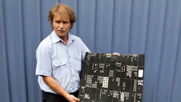 Selling to Iran, but not on the run … David Levick shows his electronic wares at his Thornleigh office yesterday.