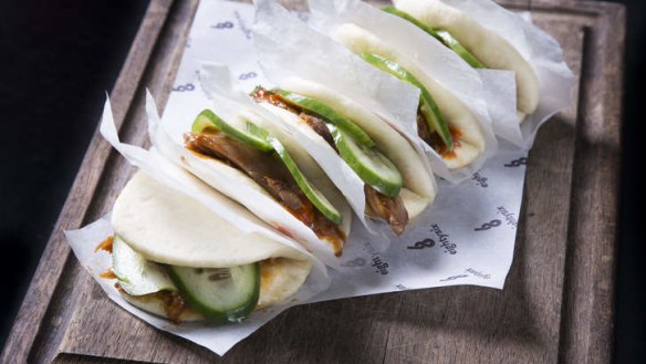 Steamed buns filled with spicy duck, cucumber and hoisin sauce.