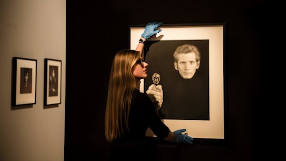Curator Isobel Parker Philip with one of Mapplethorpe's final self-portraits.