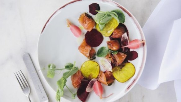 Gravlax, golden beets, pickled radish, lemon and tendrils.