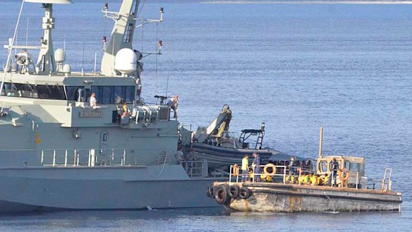 The navy intercepts a boat full of asylum seekers: Australia has been found guilty of violating the human rights of 46 refugees.