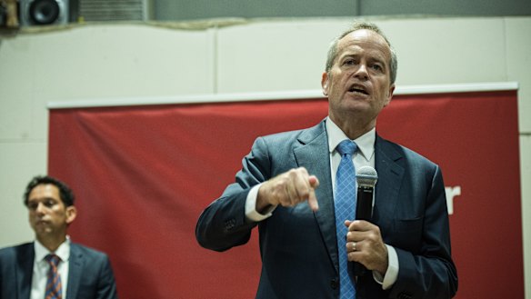 Bill Shorten addresses a community meeting in Riverwood on Tuesday night.