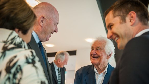 Retired Treasury official Neil Davey (second from right), 95, of Torrens, known as Mr Decimal for his role in crafting Australia's decimal currency system, at the Royal Australian Mint on Thursday with (from left), Lady Cosgrove, Governor-General Sir Peter Cosgrove and Assistant Minister to the Treasurer Alex Hawke.