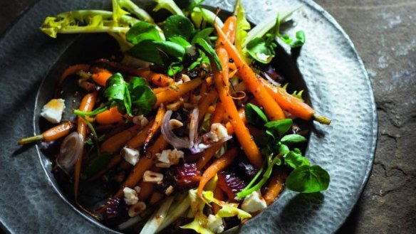 Honey-roasted carrots with dates, dandelions and Moroccan dressing.