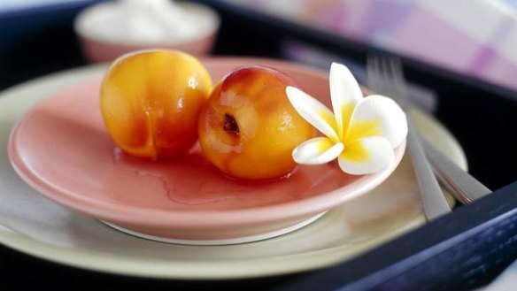 Poached nectarines with rosewater and champagne syrup.