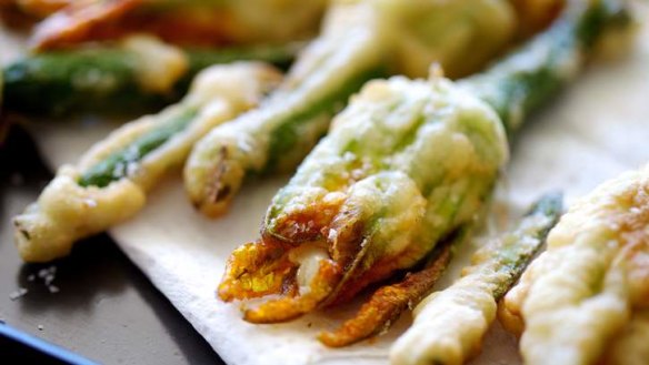 Zucchini flowers with mozzarella and anchovy.