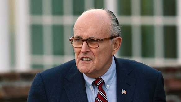 Also putting pressure on US Justice Department: Former New York mayor Rudy Giuliani.
