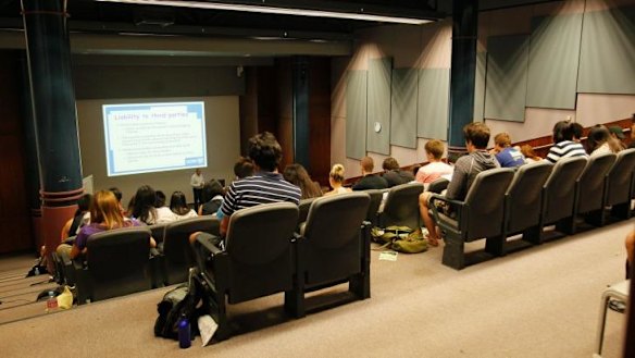 Adapting: Universities are enrolling more students to deal with funding cuts but, for students, it can just mean crowded classes and more competition when job hunting after graduation.