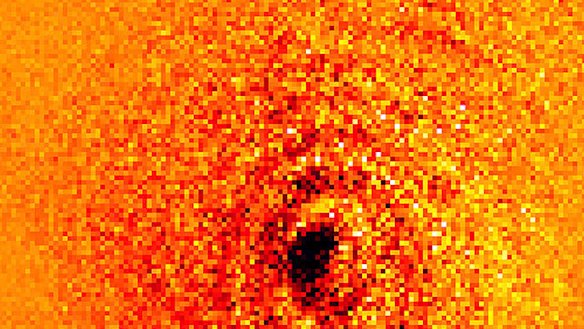 A Griffith University research team has been able to photograph the shadow of a single atom for the first time.