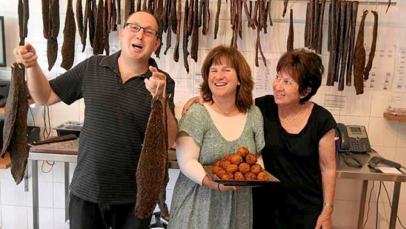 Traditional South African Jewish food: Barry and Shelley Borer and her mother Brenda Gordon with biltong and fish balls in Bianca's Grub Store.