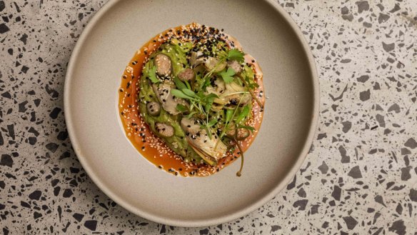 Guacamole with caperberries and charred artichokes.