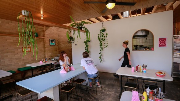 Juanita Peaches' warehouse is also home to All Day Donuts.