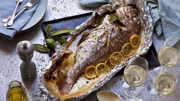 Whole snapper with dried oregano and lemon. Styling by Andrea Geisler.