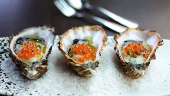 Pacific oysters with chardonnay vinegar, cucumber and salmon caviar.