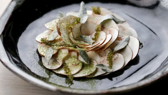 Raw swiss brown mushrooms with seaweed vinegar.