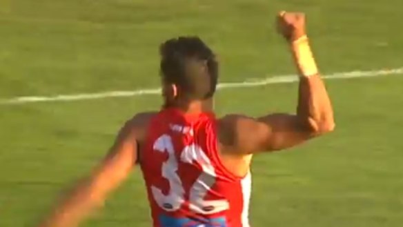 Lewis Jetta performs the war dance celebration.