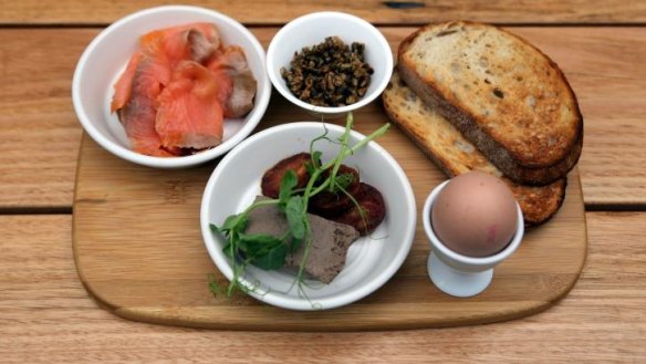 Breakfast board with soft-boiled egg, salmon, mushroom duxelles and chicken terrine at Nature Boy.