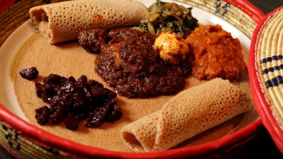 Red split lentils, chicken, diced beetroot and silverbeet served on injera bread.