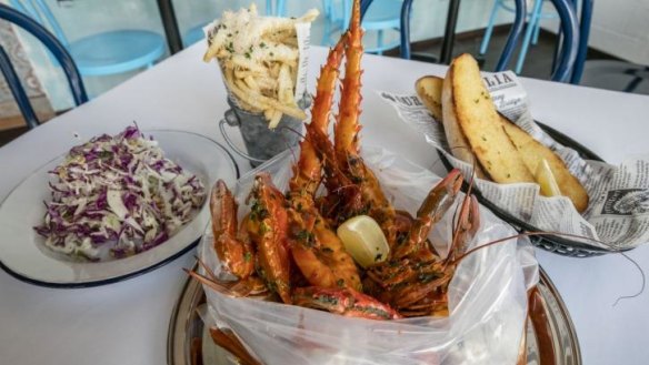 Singapore-style chilli crab and a selection of sides at St James Crabhouse & Kitchen.