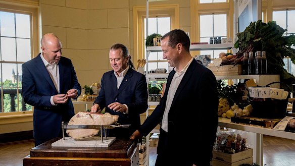 Neil Perry (centre) is spearheading a $100-million overhaul of David Jones' food business, under the leadership of chief executive John Dixon (left) and group executive of food Pieter de Wet.