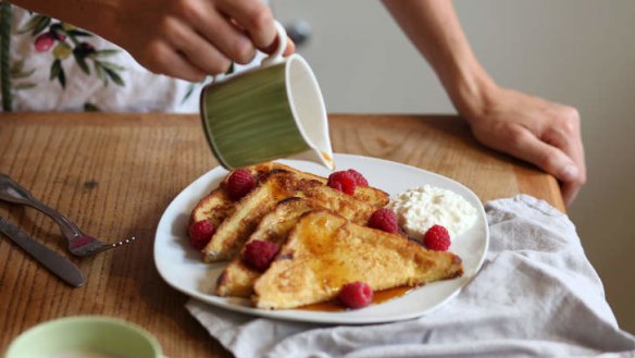 French toast with cottage cheese, berries and a drizzle of syrup.
