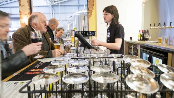 Industrial chic: Food is served among the brewing equipment.
