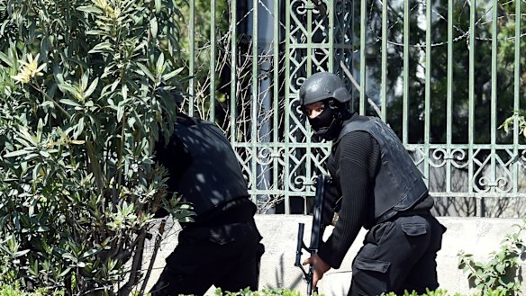 Security forces secure the area after gunmen attacked Tunis' famed Bardo Museum.