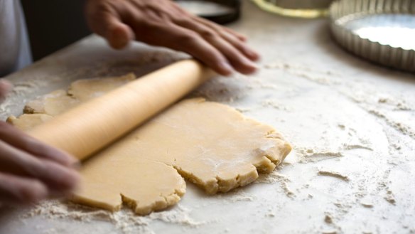 Dough is rolled out for a tart in New York, June 2017. Green pistachio filling and tangy raspberries make a great flavor combination in this delicious tart. (Andrew Scrivani/The New York Times) Baking berries CREDIT LINE MUST READ: NEW YORK TIMES