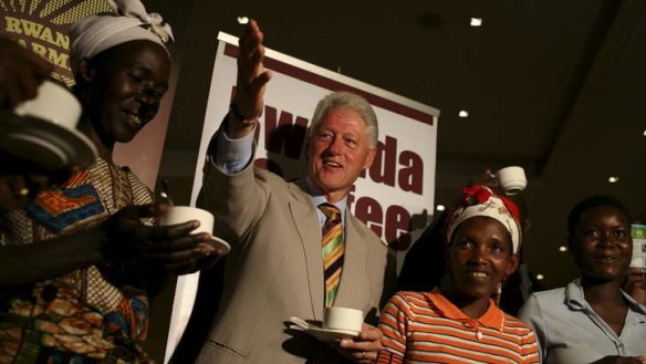 Former US President Bill Clinton meeting local coffee growers in Kigali, Rwanda, in 2008.