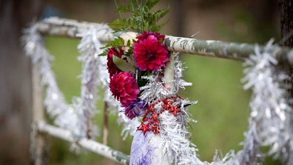 A wreath at the gate for a Queensland flood victim.