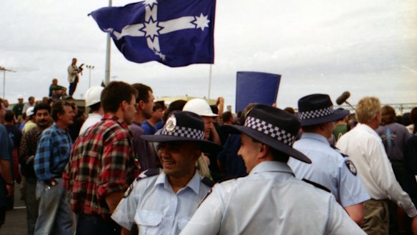 Police and protesters mingle at Webb Dock, Melbourne. April 8, 1998.