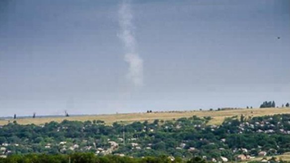 The trail of smoke left by a missile after it was fired by a the Buk-M1 system at MH17 by pro-Russia rebels, according to the Ukraine government.