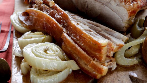 Slow-roast shoulder of pork with fennel and apples.