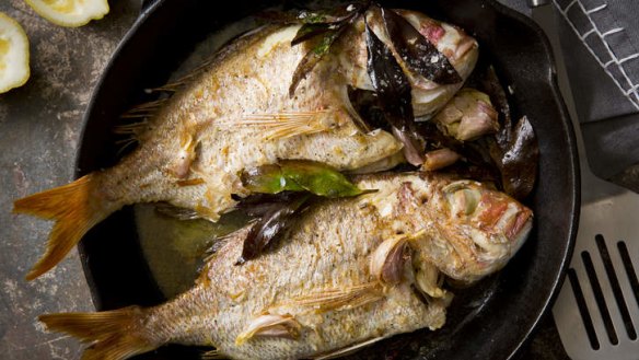 Pan roasted snapper with garlic and bay leaves.