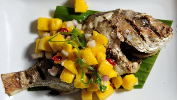 
Baked whole baby snapper with mango salsa.