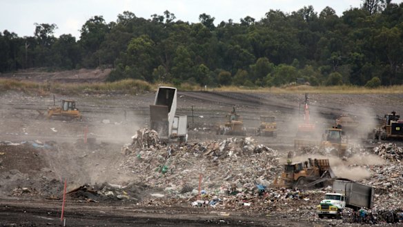 Queensland waste trucks dump unprocessed construction waste from NSW at Cleanaway's New Chum landfill in Ipswich.