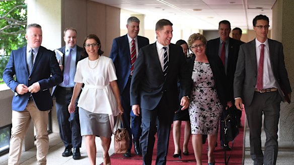 New and old Labor MPs walk into the first caucus meeting following the Queensland election.