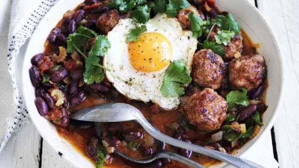 Try a lacy fried egg on an easy dinner of red beans and chorizo meatballs.