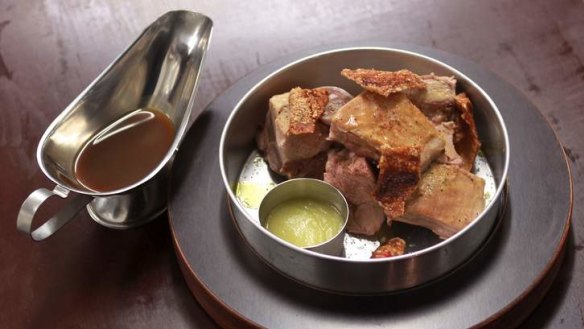 Swoon-worthy spit-roasted pork with apple rakiya sauce.