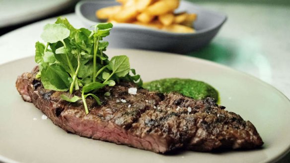 Grilled skirt steak with house fries.