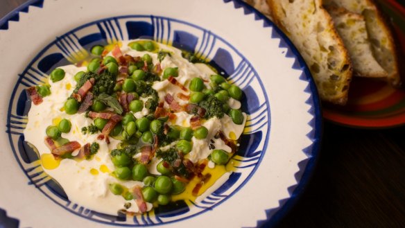 Stracciatella with peas, pancetta, salmoriglio and pangrattato with focaccia. 