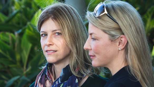 Twins Helen and Alison Telfer have both felt social pressure over their different childcare choices. 