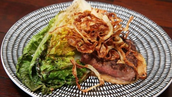 The skirt steak with grilled lettuce.