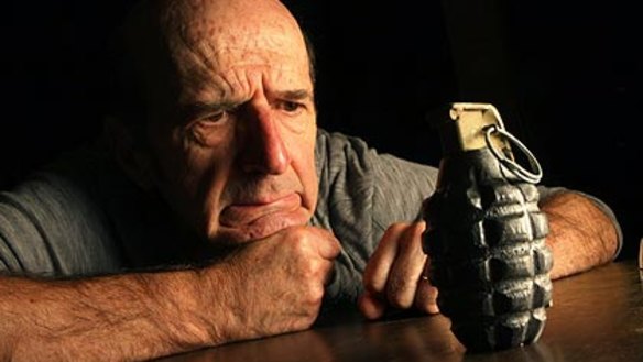 Garry McDonald muses on a hand grenade.
