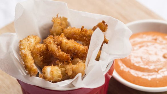 Crumbed arrowhead squid with smoked paprika alioli.