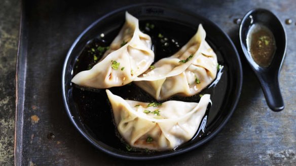 Pork and chive dumplings with red vinegar sauce.