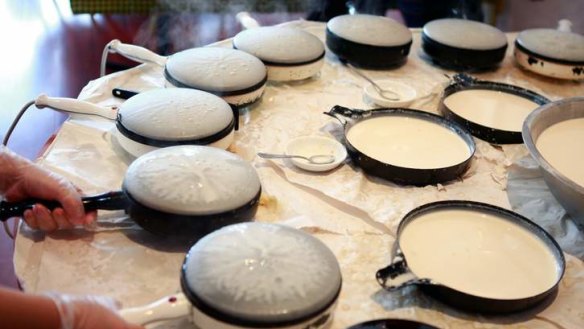 The crepe-makers run hot at Simon's Peiking Duck Restaurant.