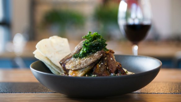 Restaurant review. Slow cooked lamb shoulder, hummus, tabouli, crispy kale and flat bread. at Social & Co. Photo Jay Cronan