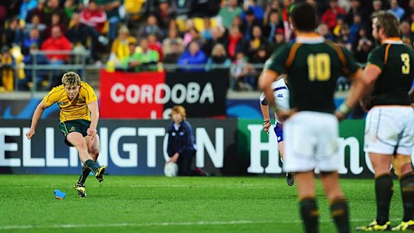 James O'Connor launches the match-winning penalty goal.